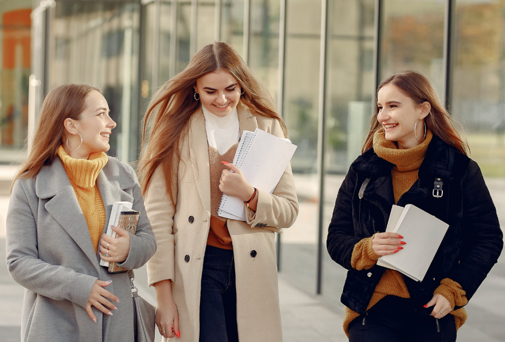 three women talking to each other